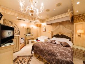Restay Nagasaki Club (Adult Only)客房内的一张或多张床位