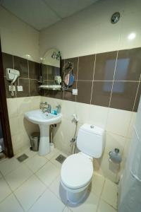Koupelna v ubytování Al Barakah Mawaddah Hotel