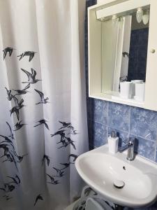 Koupelna v ubytování Apartman Natura