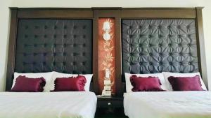Säng eller sängar i ett rum på HỒNG ANH 1 HOTEL