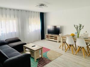 Μια τηλεόραση ή/και κέντρο ψυχαγωγίας στο Apartamento Disfruta