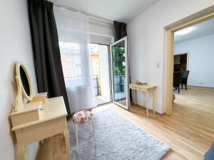 TV a/nebo společenská místnost v ubytování Wohnung zum Wohlfühlen!