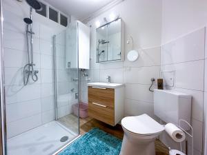 Koupelna v ubytování Wohnung zum Wohlfühlen! + 14 fotografií