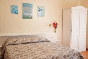 Postel nebo postele na pokoji v ubytování Agriturismo Terra Di Elea azienda agricola di Raimondo MIchela