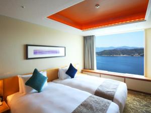 Postel nebo postele na pokoji v ubytování Grand Prince Hotel Hiroshima + 92 fotografií
