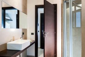 Koupelna v ubytování Ramo d'Aria Etna Boutique Hotel