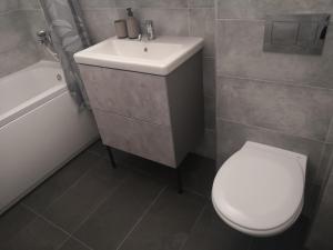 Koupelna v ubytování Dalla Rossa Apartment + 16 fotografií