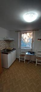 Kuchyň nebo kuchyňský kout v ubytování Kerkis Traditional Guesthouse