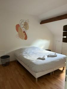 Postel nebo postele na pokoji v ubytování Sweethome – La Jacqueminière