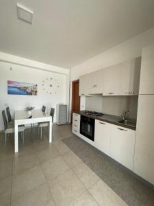 Kuchyň nebo kuchyňský kout v ubytování M&M Home