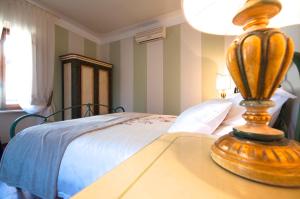 Postel nebo postele na pokoji v ubytování Bed & Breakfast Corte Toro