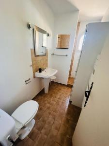 a bathroom with a toilet and a sink at Escale Douceur d'Estérel in Saint-Raphaël +16 photos