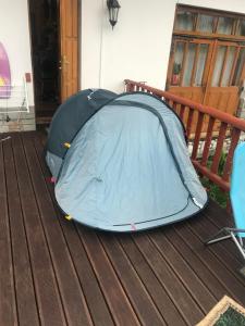 a tent on the deck of a house at Camping Zakopane Willa Skoczek oferta nie dotyczy noclegu w pokoju in Zakopane