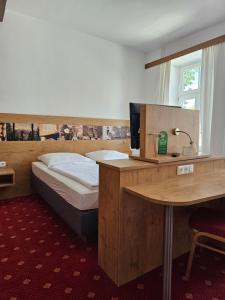 Postel nebo postele na pokoji v ubytování Gasthof Klement