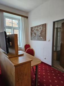 TV a/nebo společenská místnost v ubytování Gasthof Klement