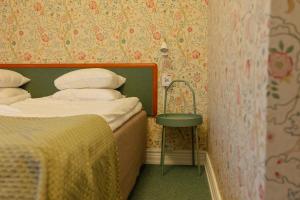 Voodi või voodid majutusasutuse Hotel Lorensberg toas