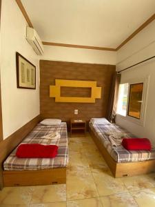 a bedroom with two beds in a room at Lidia Dahab Hotel and Restaurant in Dahab