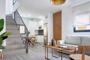 Küche/Küchenzeile in der Unterkunft Suites Maestranza - Herrería by Magno Apartments
