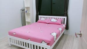 Кровать или кровати в номере Ban Saket