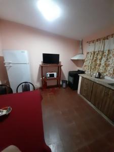 TV a/nebo společenská místnost v ubytování Valentino Apart I + 10 fotografií