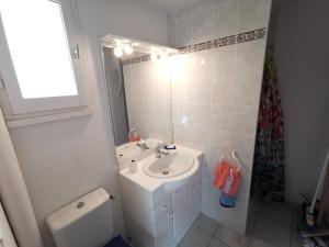 Kúpeľňa v ubytovaní Domaine des palmiers + 6 fotografií