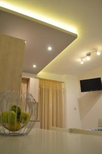 A television and/or entertainment centre at Ammos Apartments