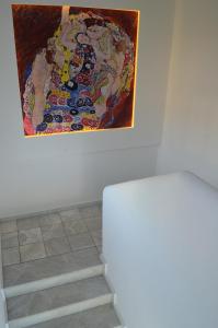 A bed or beds in a room at Ammos Apartments