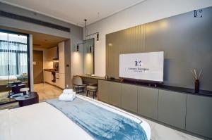 Postel nebo postele na pokoji v ubytování Luxury Escapes - Large & Brand New Studio Apt Business Bay - MAG