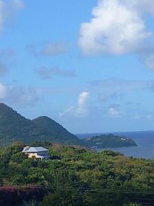 a house on top of a hill near the ocean at Bellevue hideaway in Gros Islet