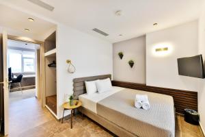 Porto Sea View Apartments客房内的一张或多张床位