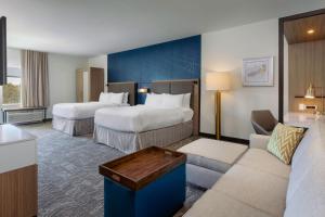 Кровать или кровати в номере SpringHill Suites by Marriott Amelia Island