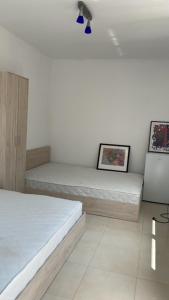 Un ou plusieurs lits dans un hébergement de l'établissement Sun Houses Novo Oriahovo