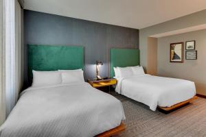 The Threefoot Hotel, Meridian, a Tribute Portfolio Hotel客房内的一张或多张床位