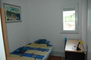 Cama o camas de una habitación en Apartments Ani
