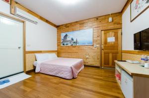Letto o letti in una camera di Donglifang B&B