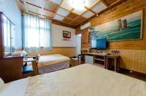 Letto o letti in una camera di Donglifang B&B