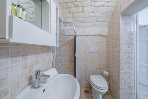 Koupelna v ubytování Salentina by Rentbeat + 10 fotografií