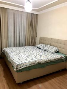 a bedroom with a bed in a room at Halic apart hotel in Yalova
