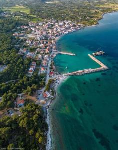 an aerial view of a small island in the water at Villa Mary Galini in Iraion
