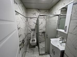 Koupelna v ubytování BEYAZ SUiTES + 16 fotografií