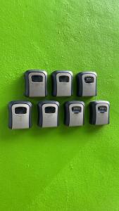 a group of four computer clips sitting on a green surface at Padang Besar Green Inn in Padang Besar