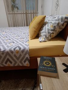 Postel nebo postele na pokoji v ubytování Apartman U2