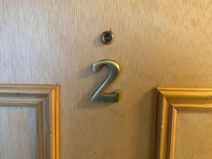 a number on a door with the number two at Seaview in Lossiemouth