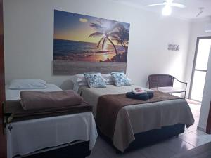 Un pat sau paturi într-o cameră la Refúgio BEM-TE-VI