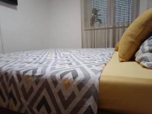 Postel nebo postele na pokoji v ubytování Apartman U2