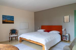 Maison Fauvel, Natur pur tesisinde bir odada yatak veya yataklar