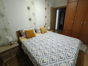 Postel nebo postele na pokoji v ubytování Apartman U2