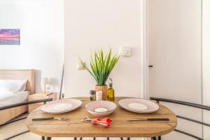 Ένα ή περισσότερα κρεβάτια σε δωμάτιο στο Urban Apt Next University 5