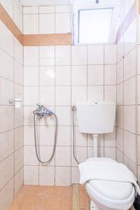 a bathroom with a toilet and a shower at Urban Apt Next University 5 in Heraklio Town
