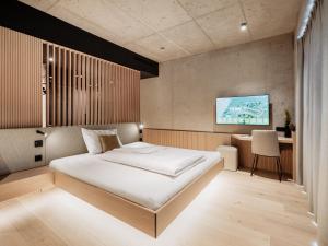 Letto o letti in una camera di Loxone Campus